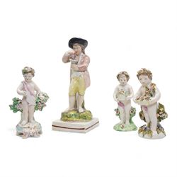 Derby porcelain model of a cherub holding a basket of flowers and wearing a chaplet, H13cm...