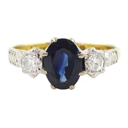 18ct gold three stone oval cut sapphire and round brilliant cut diamond ring, Birmingham 1...