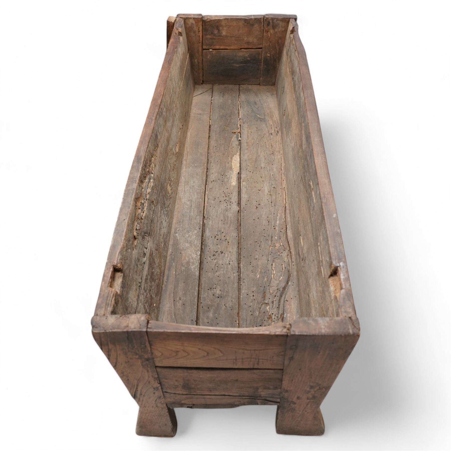 Large 18th century elm pegged and boarded dough bin, three plank top with cleated ends, tapered form with out splayed angular feet