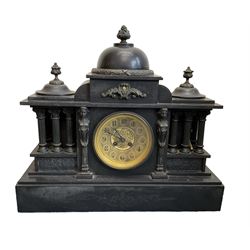 French - late 19th century Belgium slate 8-day mantle clock with conforming side temples, break front case with a central dome, recessed pilasters and a deep stepped plinth, glazed bezel with a brass dial, Arabic numerals and decorated centre, gong striking twin train movement with pendulum and key.