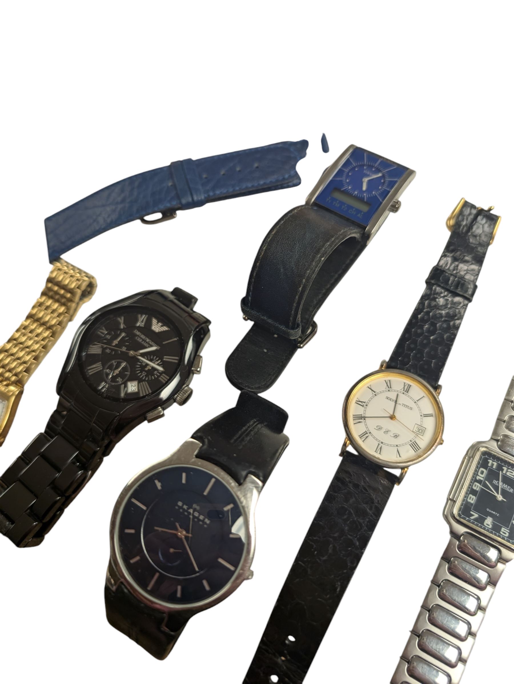 Seiko automatic wristwatch and a collection of quartz wristwatches including Tissot, Swatch, Armani ceramic, Roamer and Skagen