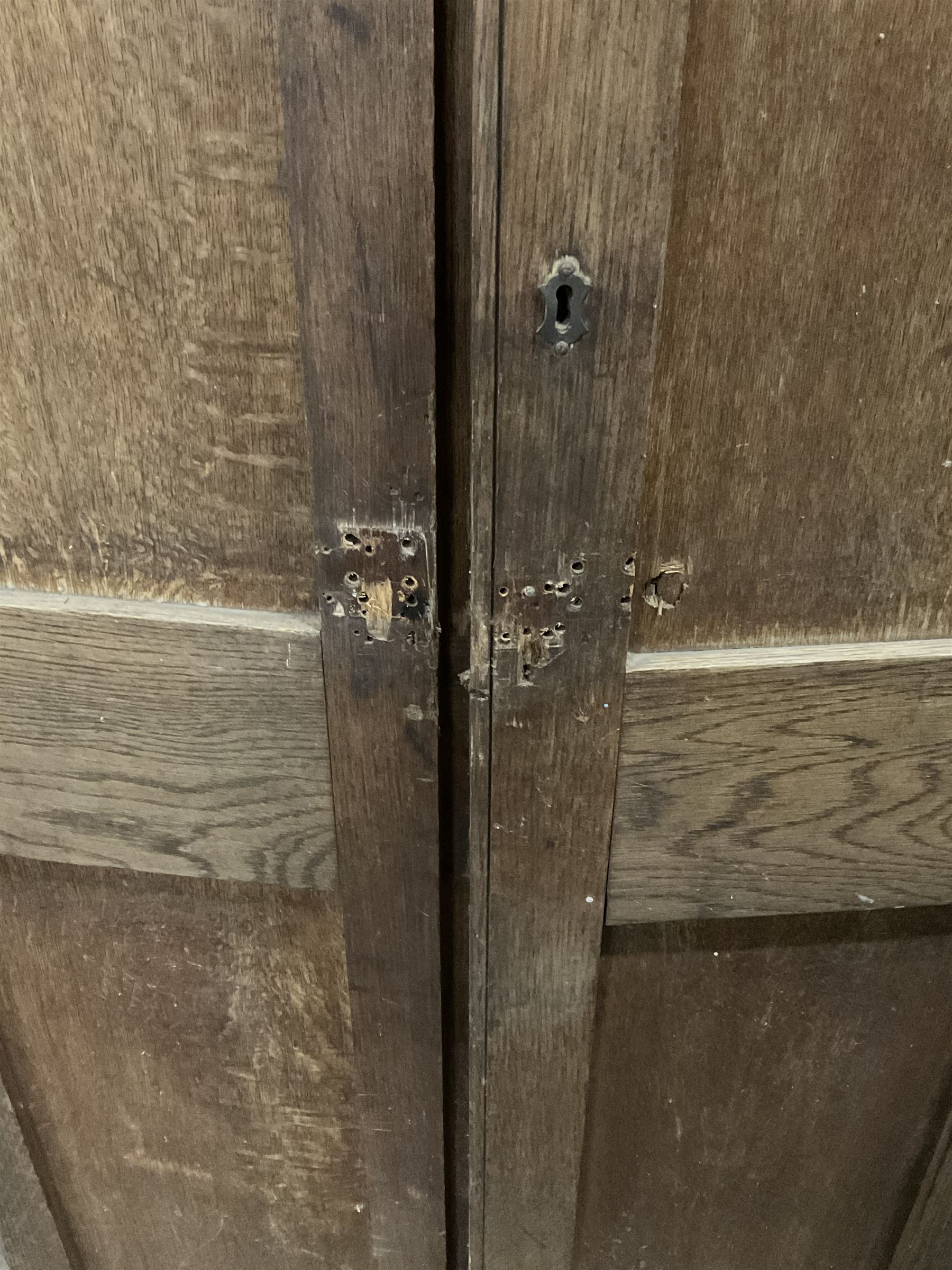 Early 20th century oak cupboard, enclosed by two panelled doors, the interior fitted with shelves and single drawer, on skirted base - THIS LOT IS TO BE COLLECTED BY APPOINTMENT FROM THE OLD BUFFER DEPOT, MELBOURNE PLACE, SOWERBY, THIRSK, YO7 1QY