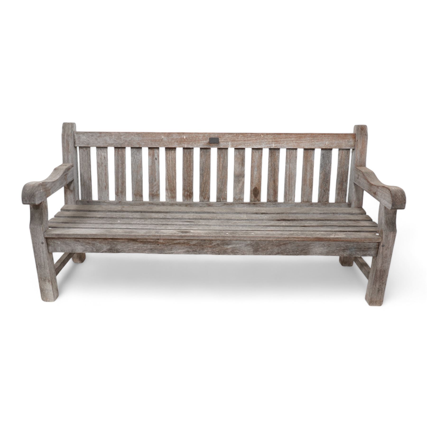 'J.V.T. Ampleforth' - teak garden bench, plain cresting rail with applied maker's plaque over slatted back and seat, on square supports 