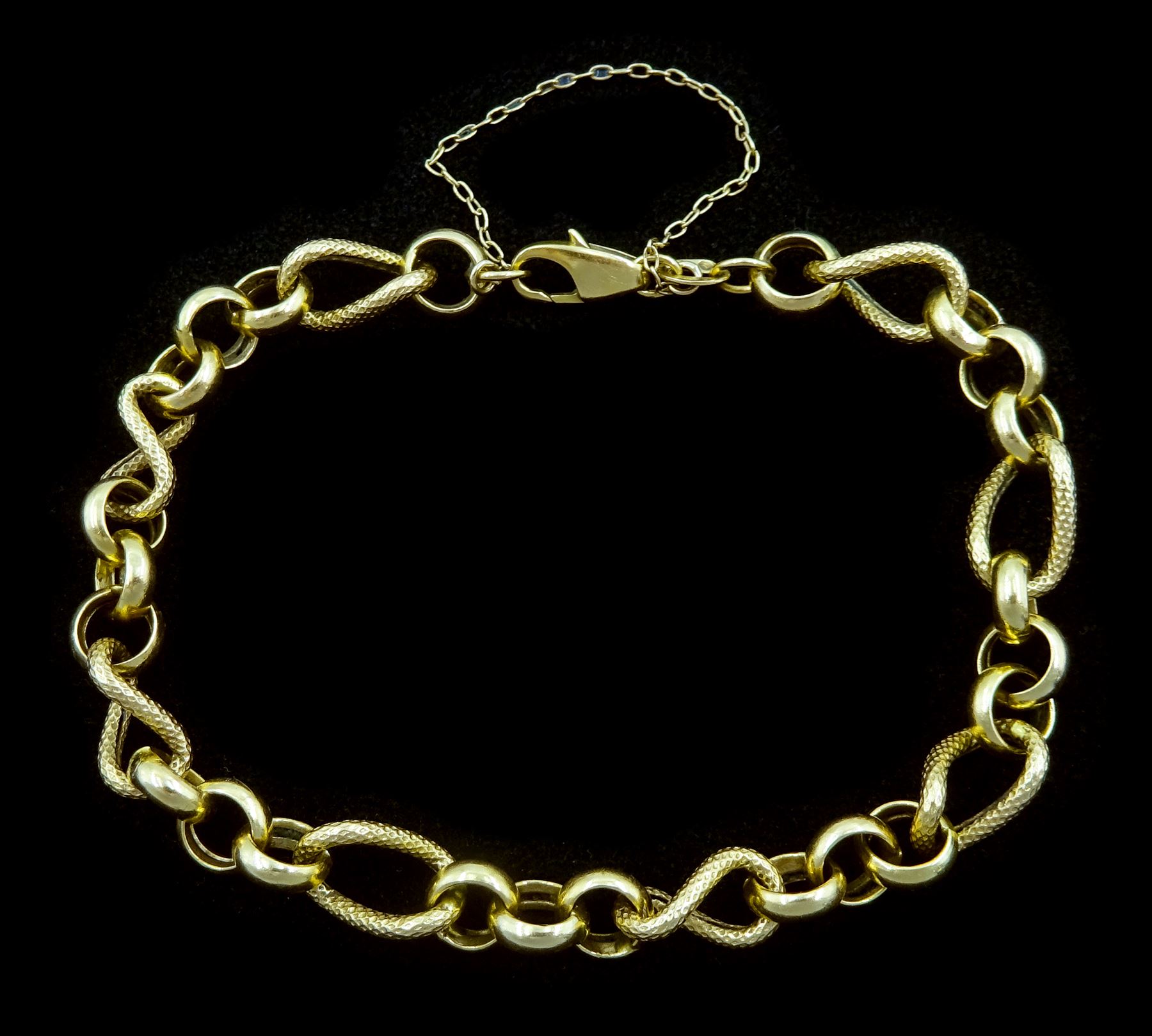 18ct gold fancy belcher and textured twist link bracelet, stamped 750