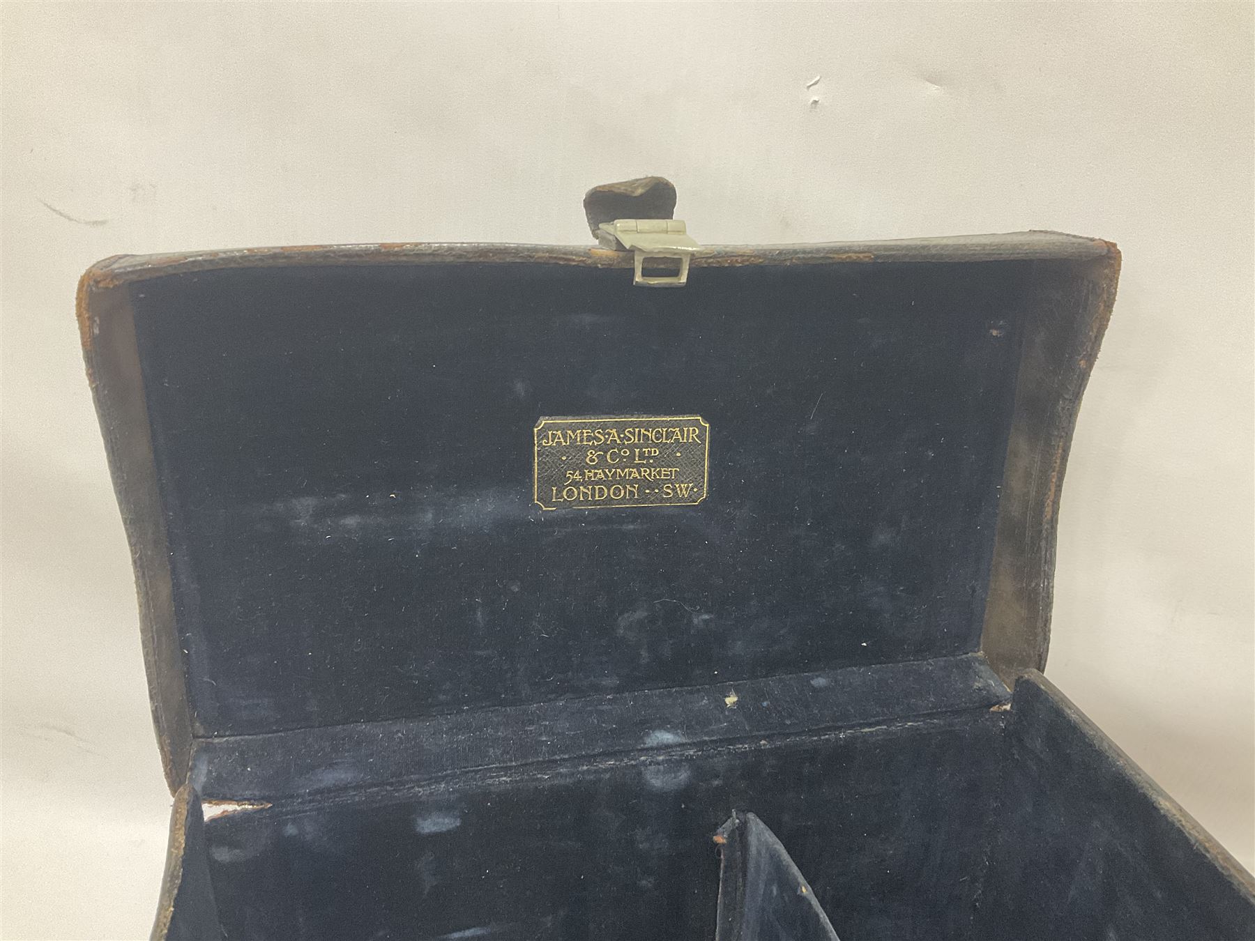 Early 20th century Adams and Co 'Videx' folding plate camera, in original leather carrying case, with various quarter plates