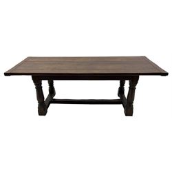 20th century Jacobean design oak refectory dining table, rectangular plank top with cleated ends, on turned supports united by H-stretchers 