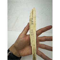 Inuit scrimshaw carved bone scraping knife, decorated with deer and tree, L25cm