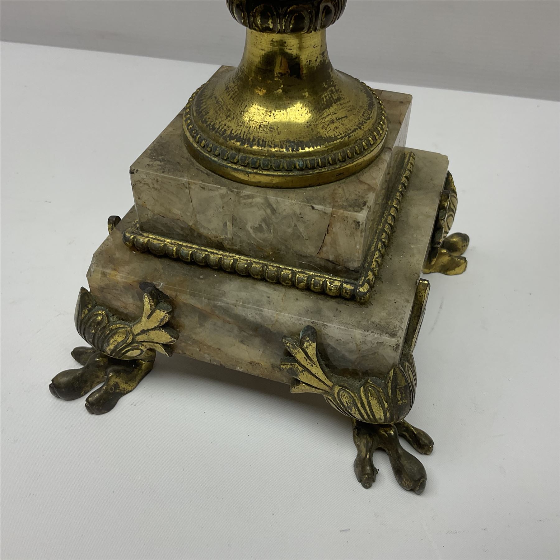 20th century five branch candelabra, with gilded floral garland and female mask decoration, to a marble effect resin urn and stepped base, upon four paw feet, H61cm