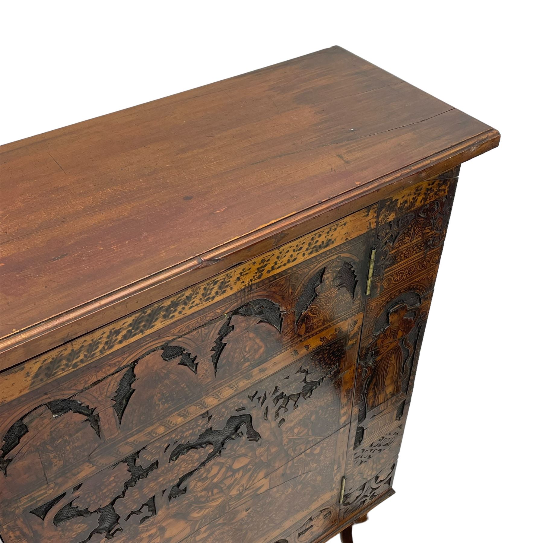 17th century and later cedarwood and pine side cupboard, moulded rectangular top, enclosed by two doors possibly removed and reused from a Venetian Cassone, carved and decorated with penwork, the upper architectural arcade with busts of noblemen, the larger decoration depicting hunters on horseback within woodland landscape with various animals, central and flanking uprights decorated with classical female figures upon pedestals, lower roundels decorated with lion and putto motifs, overall foliate decoration, raised on five hairy paw carved feet, the interior fitted with shelf