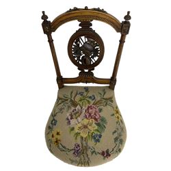 Late Victorian walnut side chair, arched cresting rail over carved and pierced splat depicting baskets and foliage, floral needle work upholstered seat, on acanthus carved and fluted turned supports