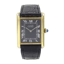 Must de Cartier Tank silver-gilt manual wind wristwatch, black dial with Roman hour marker...