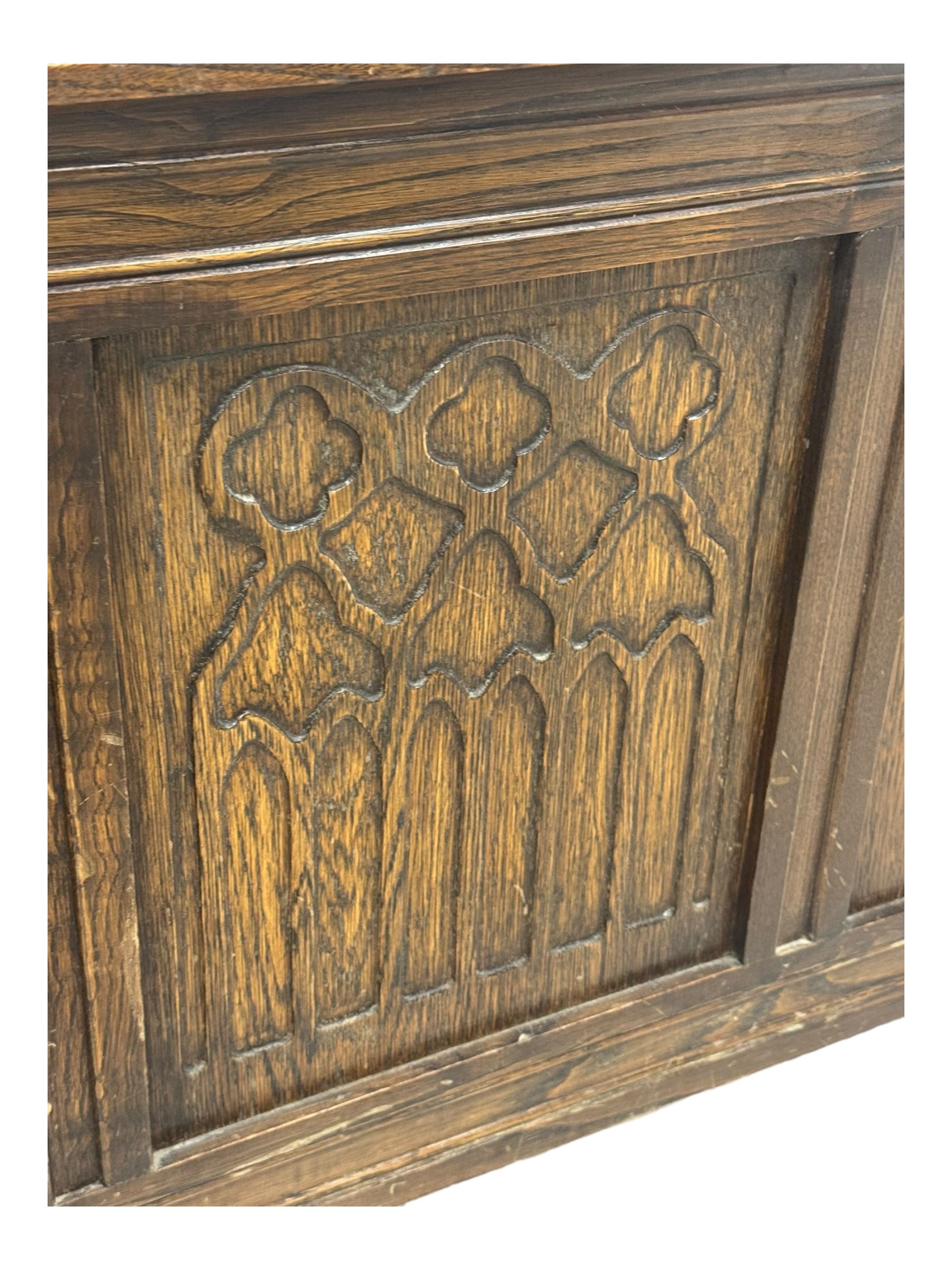 17th century design oak blanket chest, panelled hinged lid over panelled front, moulded frame, on stile supports