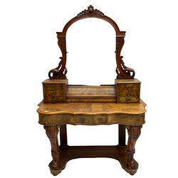 19th century figured walnut dressing table, the raised bevelled mirror back in carved foliage frame with scrolled terminals, fitted with central hinged compartment flanked by small trinket drawers, serpentine moulded top over single frieze drawer, on cabriole supports united by a platform base