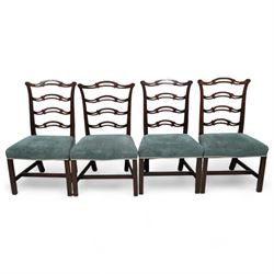 Set of four 19th century Chippendale design dining chairs, waived and pierced ladder back, upholstered in striped fabric, on square supports united by H-stretchers 