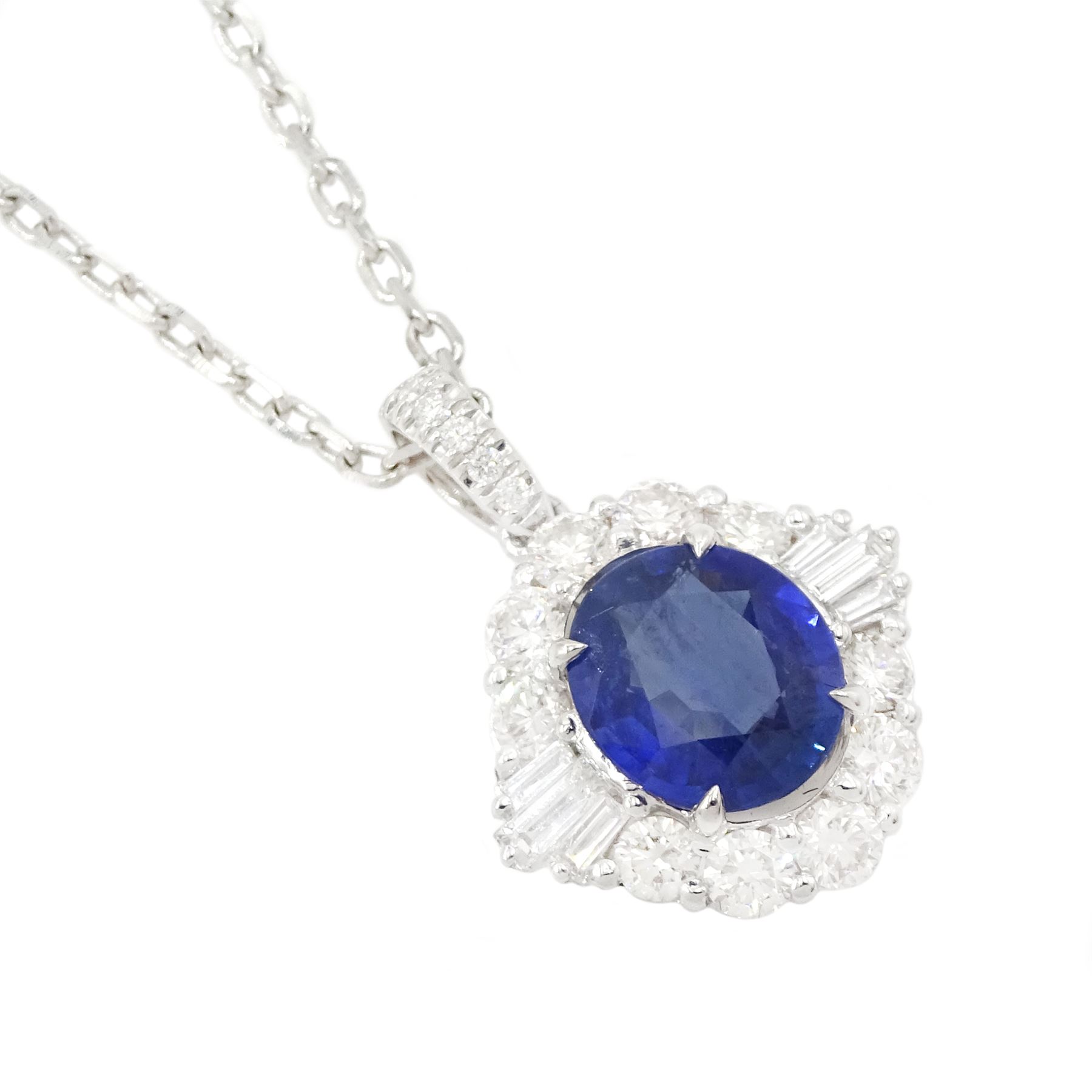 18ct white gold oval cut sapphire, round tapered baguette cut diamond cluster pendant necklace, sapphire approx 1.40 carat, total diamond weight approx 0.65 carat