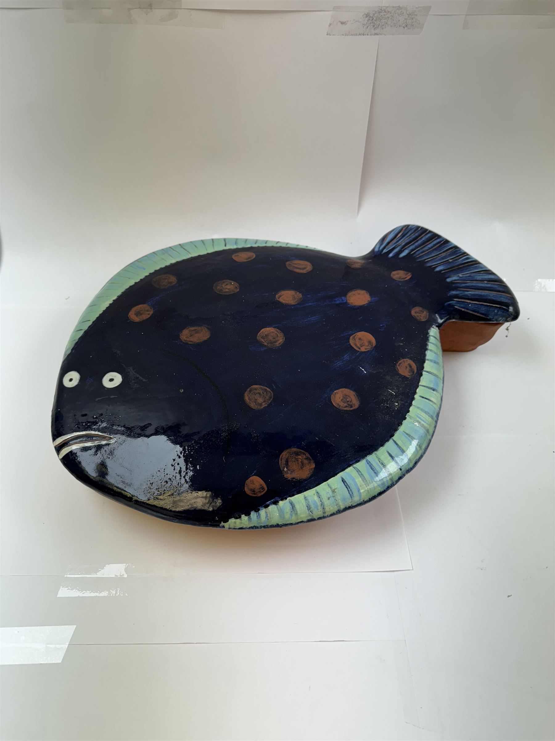 Studio pottery terracotta paella dish, modelled as a fish and finished in blue, green and brown glaze,  by Mary Hick Ceramics, Edinburgh, W44cm