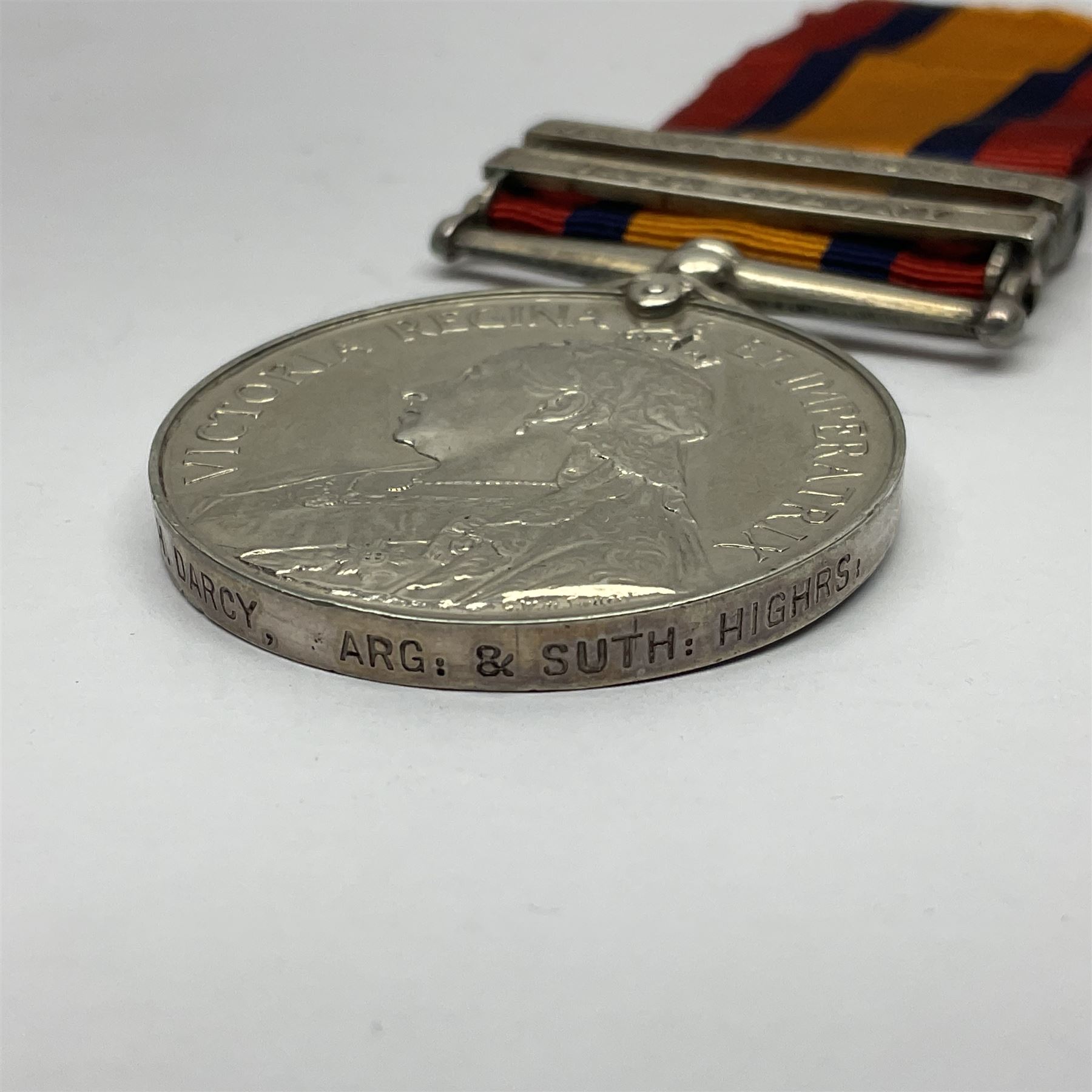 Victoria Queens South Africa Medal with Cape Colony and Orange Free State clasps awarded to 2929 Pte. H. Darcy Argyle and Sutherland Highlanders; with replacement ribbon and fragment of original.