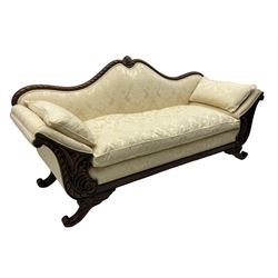 Victorian design walnut framed settee, shaped camelback with gadroon carved edge and central feather motif, upholstered in cream damask fabric with scrolling floral pattern, S-scroll arm facias carved with flower head and curled leaves, feather carved C-scroll splayed feet 