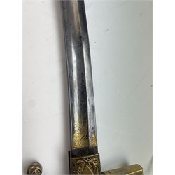 German Saxon 1st Empire Light Cavalry officer's sword c1820s, the 79cm clipped curving blade engraved with the crest of Hanover and various battle trophies with traces of blueing and gilding, brass hilt with knucklebow, foliate square langets, ornate downswept quillon, wire-bound fish skin grip with lion's head pommel; in brass scabbard with two suspension rings L95cm overall