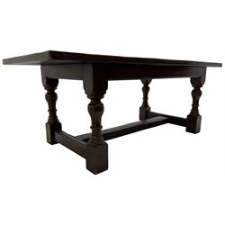 20th century oak refectory dining table, rectangular cleated top on turned supports joined by H-stretcher