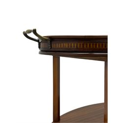 Edwardian satinwood tray top stand of oval form, tray top with glazed base and brass handles over two tiers, each with checkered inlaid band, on square tapering and splayed supports