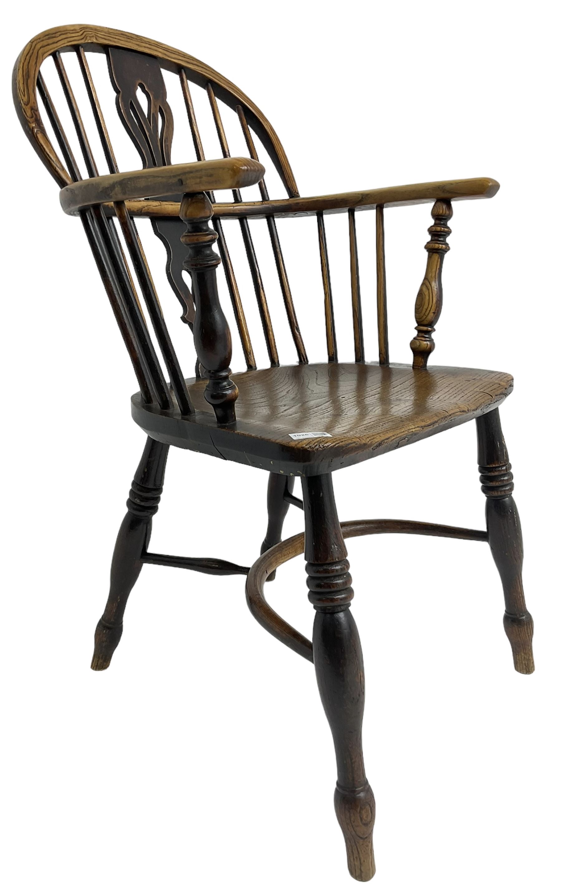 19th century elm and ash Windsor armchair, low double hoop and stick back with shaped and pierced splat, on turned supports united by crinoline stretcher