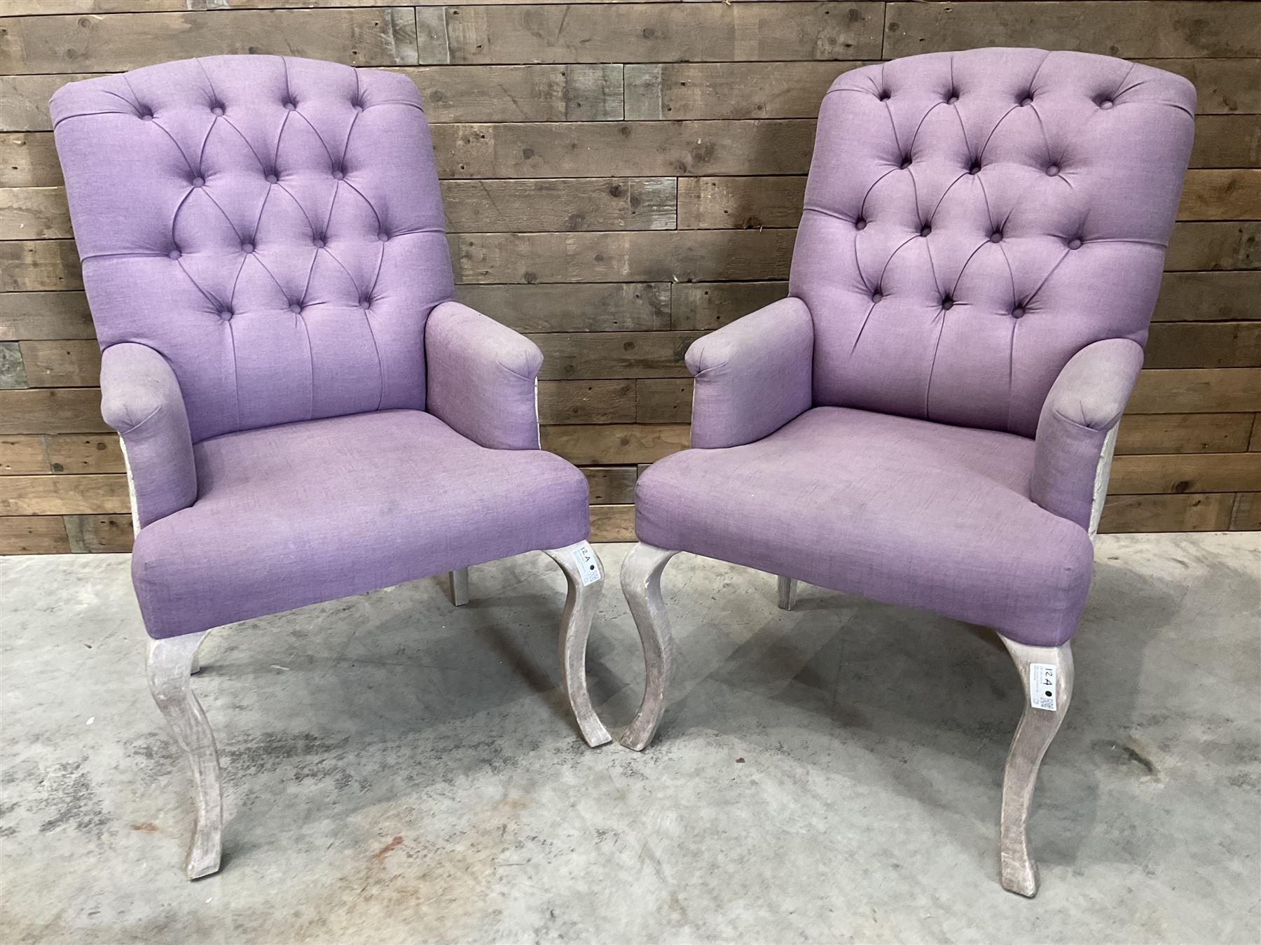 Voyage - two high back armchairs upholstered in buttoned lilac and tweed fabric, painted cabriole legs