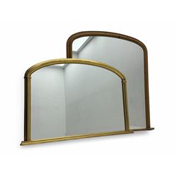 Pine overmantel mirror, plain mirror plate set within an arched frame, on shaped supports ...