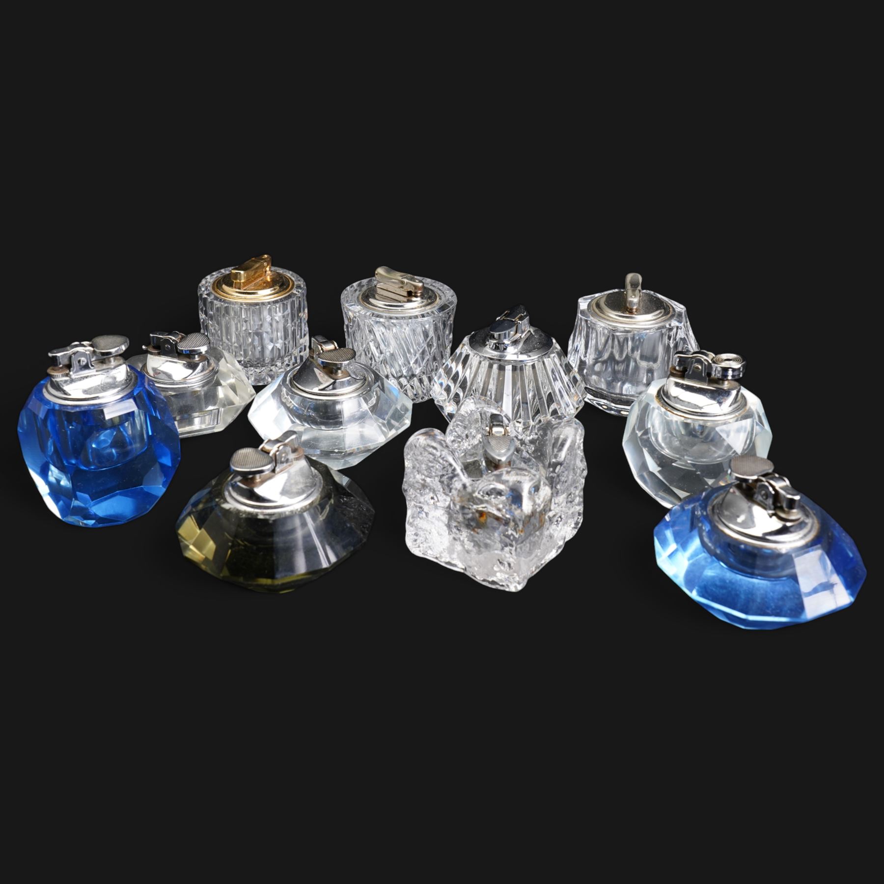 Colibri Webb Corbett crystal table lighter, another Colibri crystal table lighter, Ronson crystal table lighter and eight others 