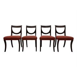 Set of six (4+2) George III design mahogany dining chairs, curved reed moulded bar back over curved and reeded middle rail, upholstered in red fabric with repeating pattern, on moulded sabre supports 