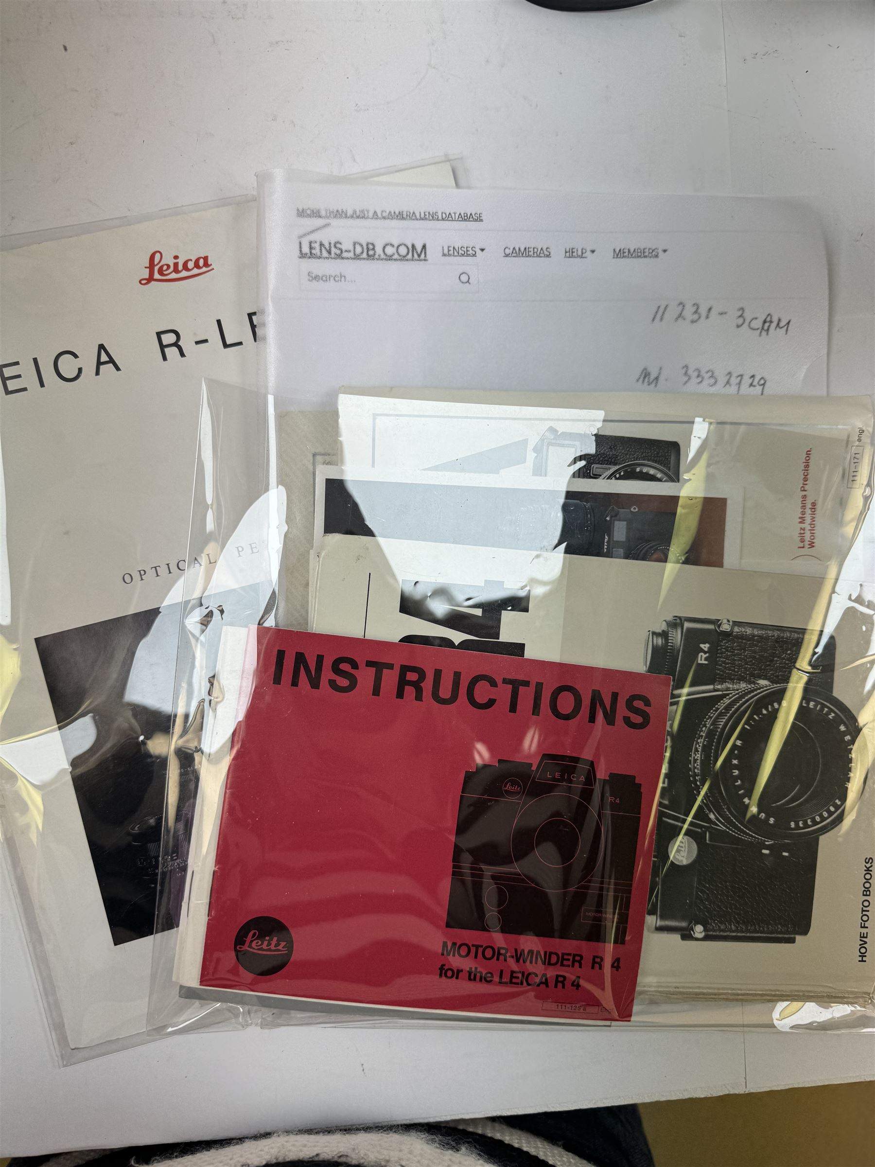 Leica R4 SLR camera body, serial no. 1609604, together with  with Leitz Vario Elmar-R 1:4 5/75 - 200mm and Elmarit -R 1:2 8/35mm lenses, and Motor Winder R4 14282, all in original boxes