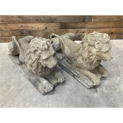 Pair of large cast stone Langport recumbent garden lions, rectangular plinth base