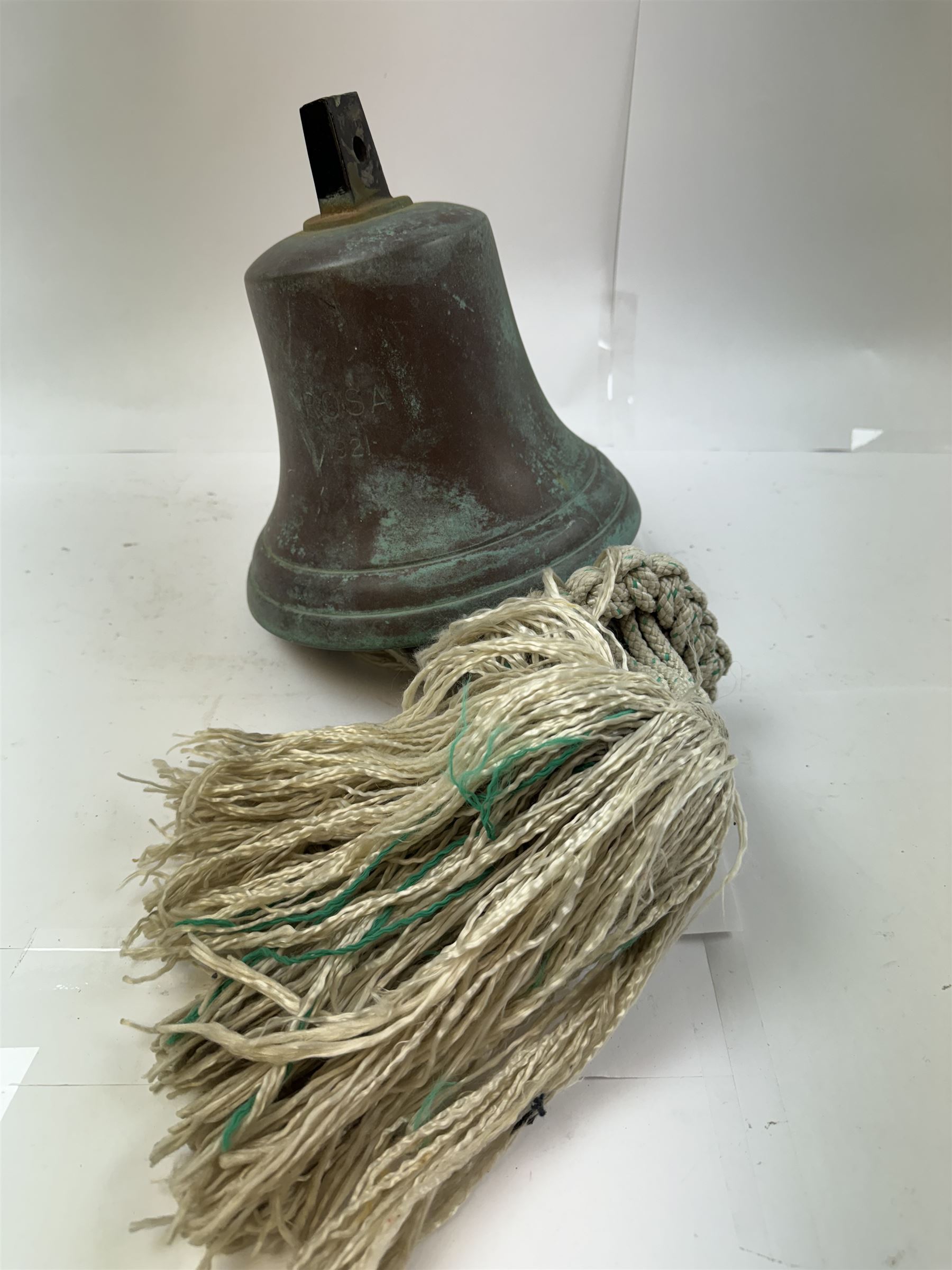 Early 20th century bronze ship's bell, inscribed 'Rosa 1921', with plaited rope pull, H19cm