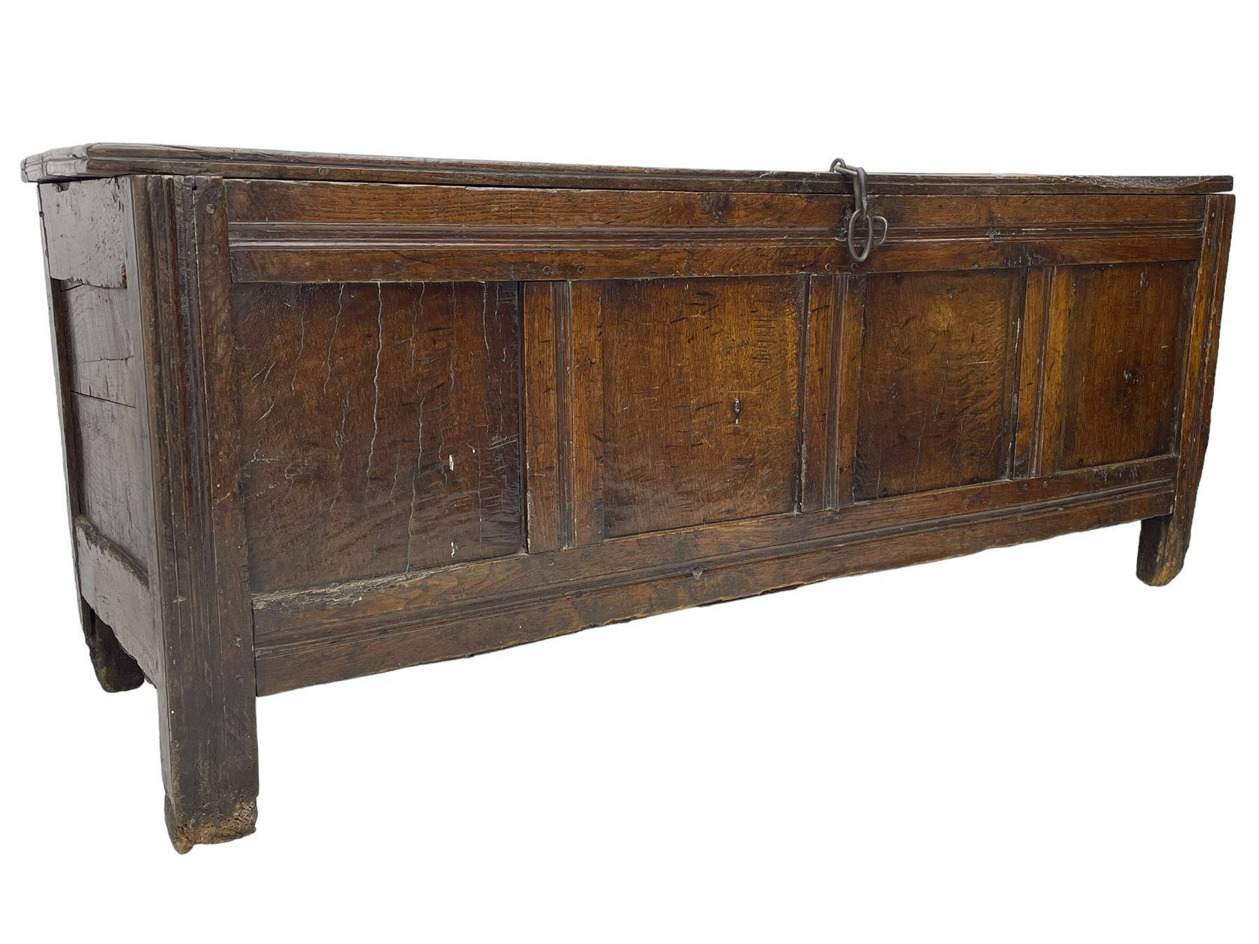 17th century panelled oak blanket chest or kist, quadruple panelled hinged lid over quadruple panelled front, moulded frame and pegged construction, on stile supports