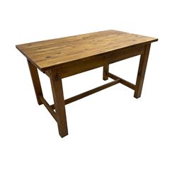 Traditional waxed pine kitchen or dining table, rectangular top over square supports united by H-stretcher