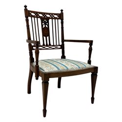 Edwardian inlaid rosewood elbow chair, pierced cresting rail over carved ribbon tie and oval inlaid panel, upholstered in stripe and floral pattern fabric, on square tapering supports with spade feet 