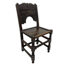 Set of three 18th century carved oak back stools, the cresting rail carved with scrolling foliate motifs over an arched panel with a stylised tree carving with extending leafage, the panelled seat held within a bobbin-turned frame, raised on turned supports united by a ring-turned front stretcher