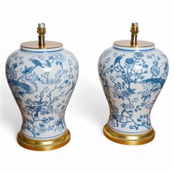 Pair of large table lamps of baluster form, decorated with exotic birds perched in floweri...