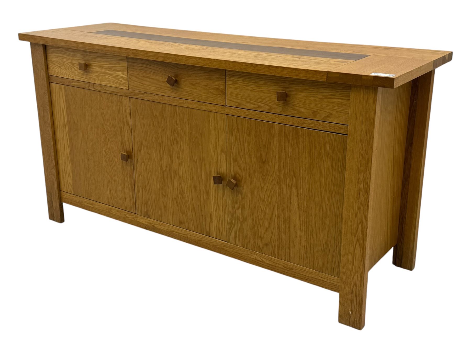 Contemporary oak sideboard, rectangular top with central contrasting plank, over three frieze drawers and three cupboards with enclosed shelving, on rectangular stile supports