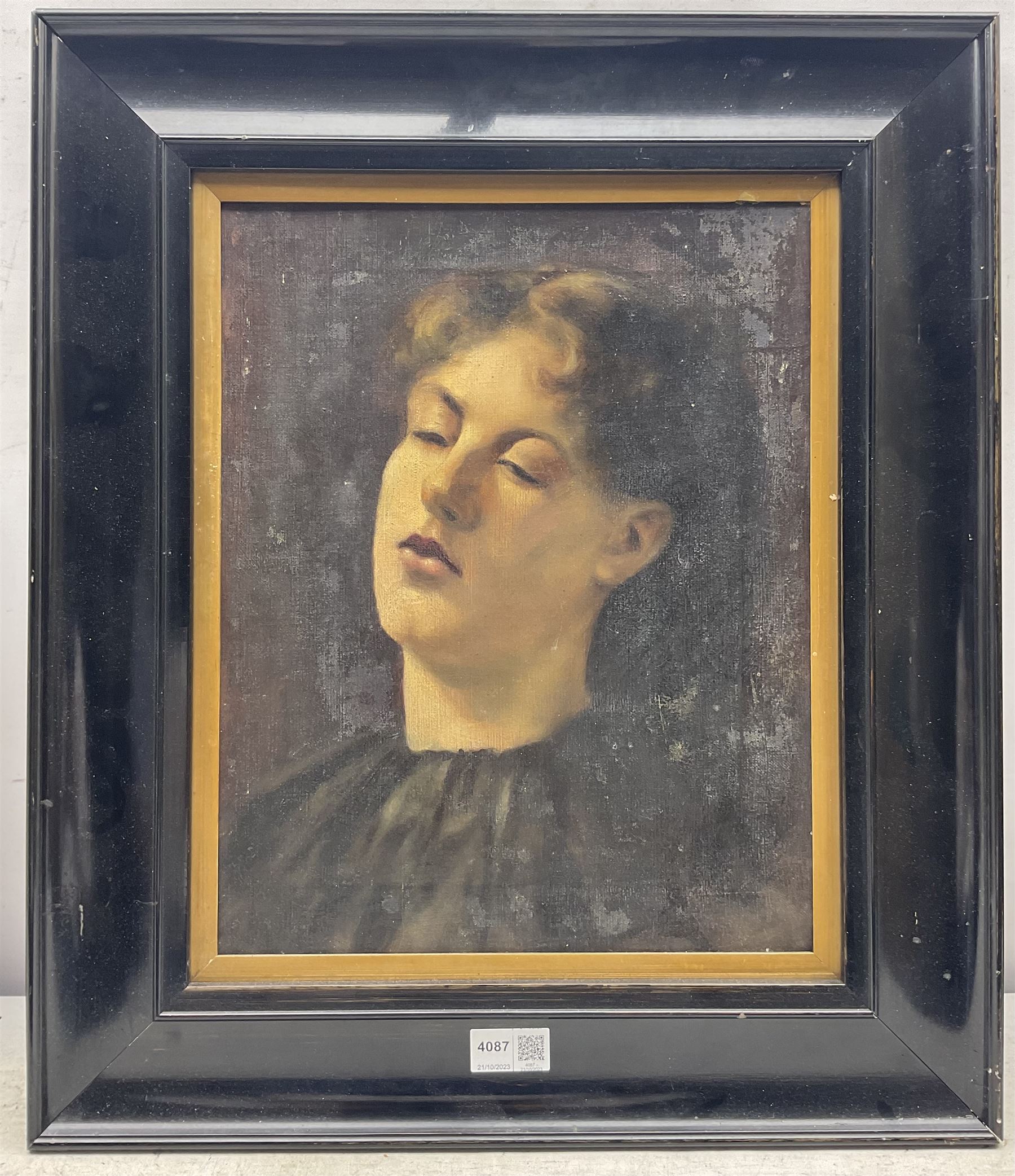 English School (Early 20th century): Portrait of a Young Lady, oil on canvas unsigned, with ESK (Examined South Kensington) stencil verso 37cm x 29cm