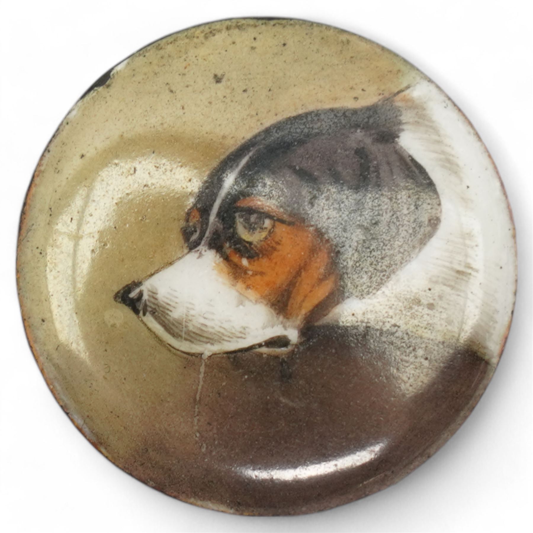 Three unmounted 19th century circular enamel discs, each painted with a portrait of a dog, comprising a Bloodhound after Sir Edwin Landseer, a Pug and a Terrier, all unsigned, D2.2cm (3)