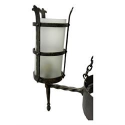 Wrought metal ceiling light, four branch with strapwork lanterns (D55cm); together with a pair of matching wall sconces (H32cm)