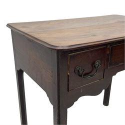 George III mahogany low-boy, moulded rectangular top with rounded front corners, fitted with three cock-beaded drawers, beaded circular brass handle plates and swan neck handles, shaped apron, on square supports with inner chamfer 