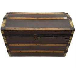 Early to mid 20th century wood and metal bound trunk, with hinged dome lid