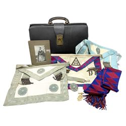 Quantity of Masonic regalia to include aprons, medals, sash etc, housed in black travelling bag