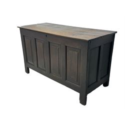 18th century oak coffer, rectangular plank lid over four panelled front and panelled sides, on stile supports 