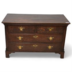 18th century oak chest, rectangular protruding top with moulded edge, fitted with two short over two long drawers, flanked by quarter-canted plain pilasters, raised on shaped bracket feet