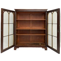 Early 20th century mahogany bookcase, fitted with two astragal glazed doors enclosing three adjustable shelves