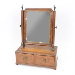 George III mahogany toilet mirror, the swing mirror with gesso border, upon a stand with t...