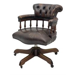 Georgian design tub-shaped office desk chair, upholstered in buttoned brown leather, on five spoke base with castors 